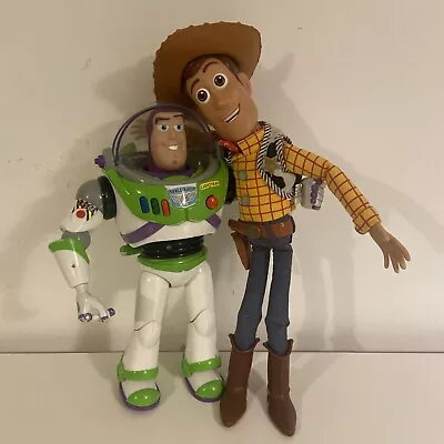 TOY STORY - Talking Sheriff Woody & Buzz Lightyear. • £30