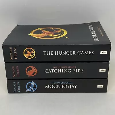 The Hunger Games Trilogy Paperback Catching Fire Mockingjay Suzanne Collins EUC • $32.99