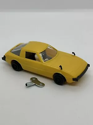 Mazda Savanna Rx7 Motorised Wind Up Plastic Car 12cm Long. • $47.50