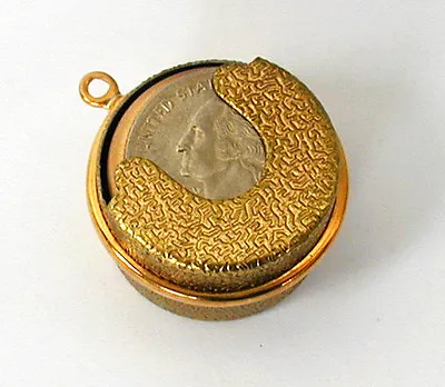 VINTAGE BRASS PLATED COIN QUARTER HOLDER DISPENSER CHARM PENDANT • 1970s 1960s  • $5.99