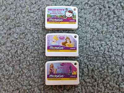 Lot Of (3) MobiGo Games VTech Tangled Hello Kitty Disney • $14.95