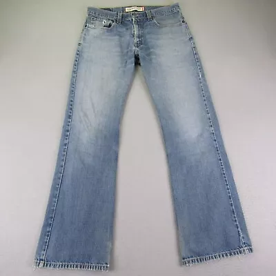 Levis Jeans Mens 32x32 Blue Denim 527 Low Boot Cut Cowboy Distressed Pants ^ • $34.97