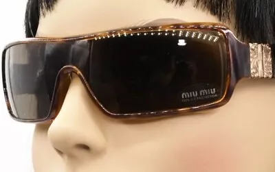 Miumiu By Prada SMU05H Sunglasses • £42