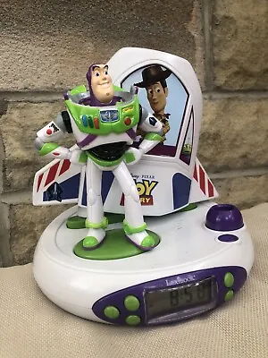 LEXIBOOK Toy Story Disney Buzz &Woody Projector Radio Clock Night Light Activity • £11