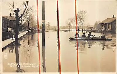 TAWAS CITY Michigan RPPC Postcard Iosco County 1912 Flood Boat On Matthew Street • $19.99