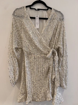 £20 • Buy Topshop Sequin Ruffle Wrap Mini Dress In Ivory Silver Embellishment - Size 12