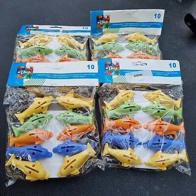 Pack Of Multi-coloured Dolphin Clothes Pegs (10 Per Pack). • £0.99