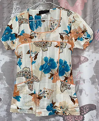 BABY PHAT  Women Scrub Top XS White Floral Pockets Short Sleeve Scoop Neck • $14.99