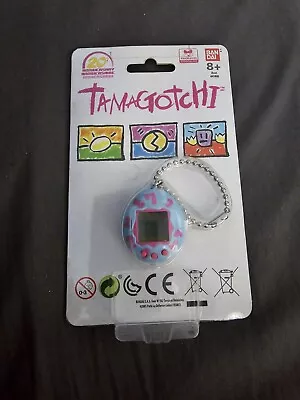 20th Anniversary Tamagotchi - Blue And Purple • £39.99