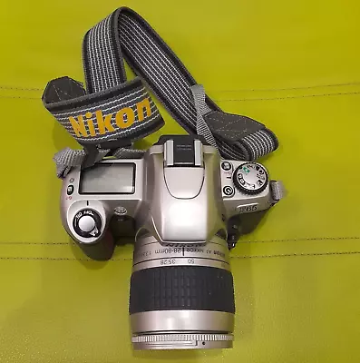 VINTAGE NIKON CAMERA F 65 LENS NIKKOR 28-80mm 1980s MADE THAILAND 2509606 • $79