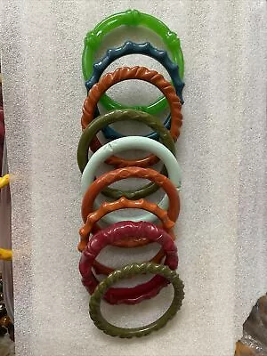 Pre Owned Molded Lucite Bakelite Plastic Set Of 9 Carved  Bangle Bracelets. • $17.50