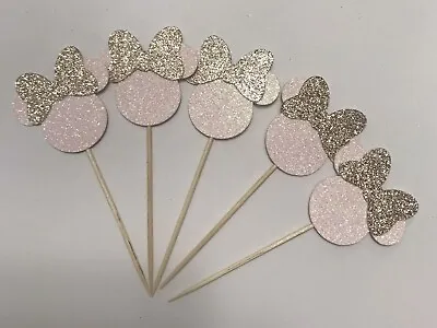 25  2” Minnie Mouse Cupcake Toppers • $15