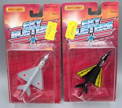 TWO  MATCHBOX  SKYBUSTERS  SB-6 RUSSIAN MIG-21 **SILVER And BLACK**  MINT CARDED • $4.95