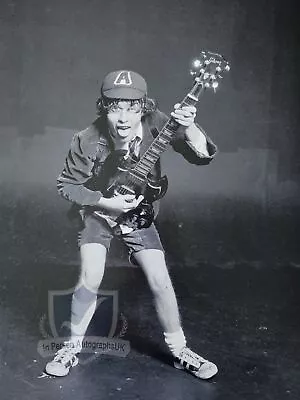 Angus Young AC/DC Signed 16x12 Photo OnlineCOA AFTAL • £396