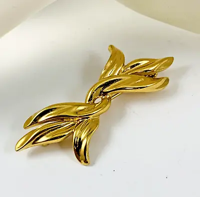 Vintage MONET Signed Polished Gold Tone Brooch Modernistic Bow Pin • $15.99