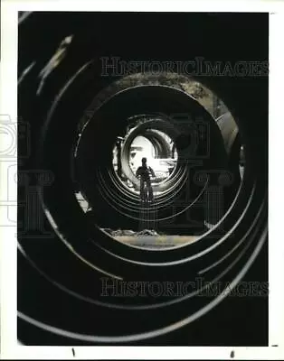 1993 Press Photo Young Boy Rides Through The Massive Pipe In Guadalajara Mexico • $23.90