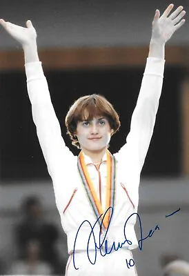 £59.99 • Buy Nadia Comaneci Standing On Podium After Winning Silver Medal Signed 12x8 Photo