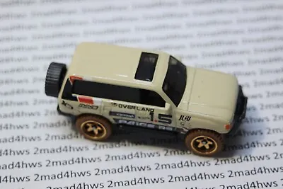 Hot Wheels PACKAGE Pull Vanilla TOYOTA LAND CRUISER 80 Mud Studs Loose • $2.99