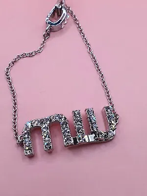 Authentic Miu Platinum Tone Crystal Embellished Logo Bracelet  • $305.05