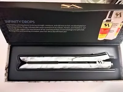 Straight Ahead: Steam Straight Flat Iron Bionic Pro With Additional Products • $220