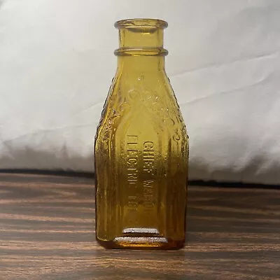 Vintage WHEATON GLASS Chief Wahoo Electric Tonic Cathedral Brand Amber Bottle • $10.99