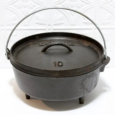 Lodge Dutch Oven Cast Iron 3 Footed 10 Inch 4 Quart With Lid & Book Vintage • $52