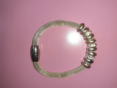 £5 • Buy Ladies Magnetic Silver Colour Bracelet
