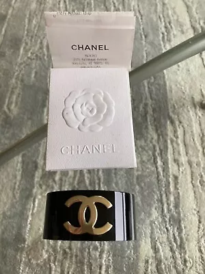 CHANEL Black Resin Gold Logo Cuff • $700