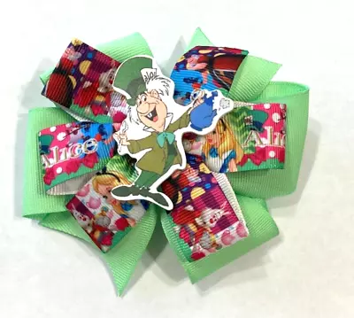 Beautiful Disney's Alice In Wonderland  Mad Hatter  Inspired Hairbow. • $10.95