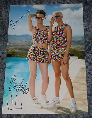 BRATAVIO  - X FACTOR-  12x8  PHOTO SIGNED - (66) • £4.99