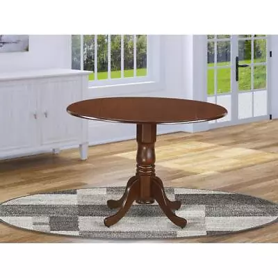 Dublin  Round  Table  With  Two  9   Drop  Leaves  In  A  Mahogany  Finish • $174.92