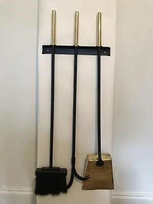 Restored Mid Century Wall Mounted Brass And Black Fireplace Tool Set  • $175