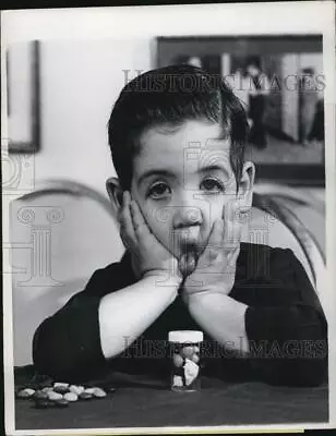 1968 Press Photo Boy Douglas Shaw Frustrated Over Child-Proof Medicine Bottle • $19.99