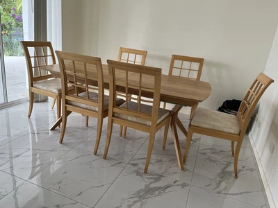$200 • Buy 8 Solid Timber Dining Chairs With Cream Cushions