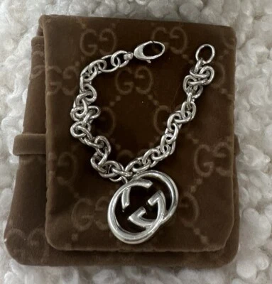 £100 • Buy Genuine Gucci Sterling Silver Interlocking GG Britt Bracelet With Pouch Box
