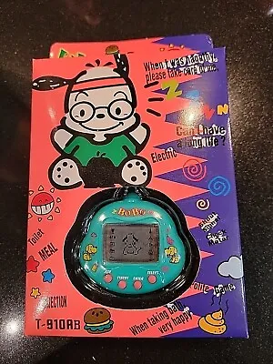 Electronic Virtual Pet Vivy Dog Puppy Blue Teal New In Box • $15.90