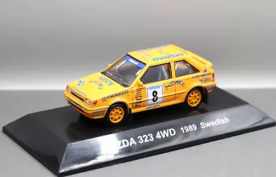 Cm's 1/64 Rally Car Collection SS.15 Mazda 323 Familia 4WD 1989 Swedish No.8 WRC • $31