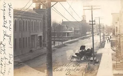 G99/ Oak Harbor Ohio RPPC Postcard 1906 Church St Stores  Building 2 • $26.45