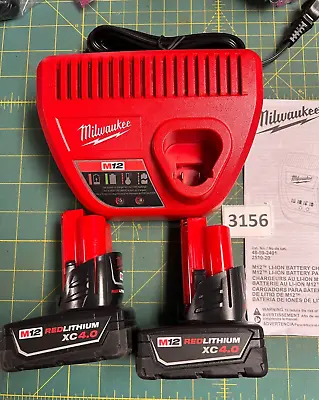 Lot Of 2 Unused Milwaukee M12 4.0 AH Batteries & Charger (3156 • $99.99