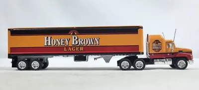 Matchbox Ultra Orange Mack CH600 Honey Brown Lager Semi And Trailer 1:97 • $16.20
