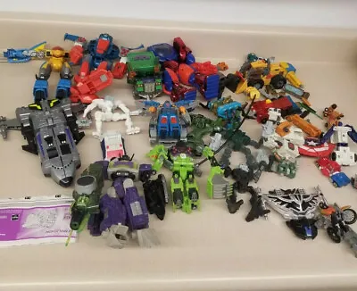 Huge Lot Of Transformers Figures Parts And Peices. AR377 • $100