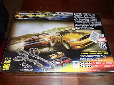 Ford Mustang BOSS 302 Metro Chase Electric Powered Road Racing Slot Car Set • $47.77
