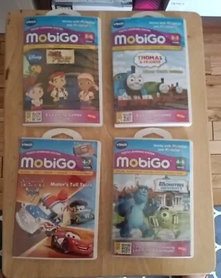 Lot Of 4 Vtech Mobigo Learning System Game Cartridges  • $18.58