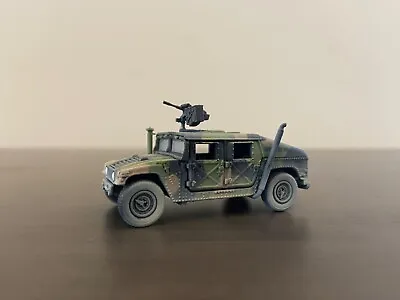 1/64 Johnny Lighting- M1025 HMMWV Camouflage Military Humvee- (Wheeled Warriors) • $24.99