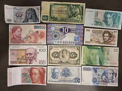 Lot Of 12 European Banknotes • $60