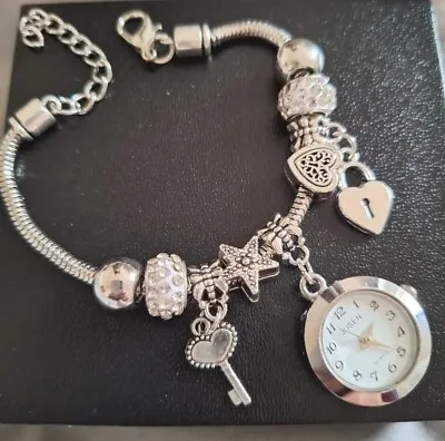 Charm Bracelet With Charms And Watch • £20