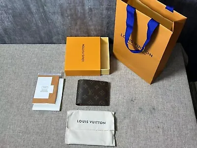 Louis Vuitton Canvas Brown Wallet • $135