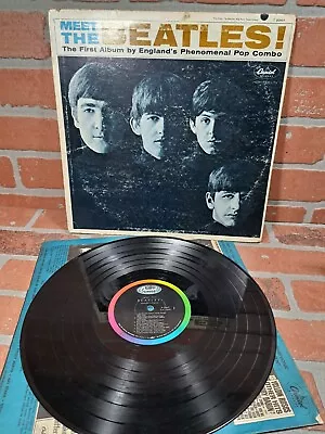 The Beatles LP:  Meet The Beatles! - Capitol T 2047  • $18.99