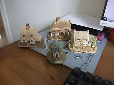 Delightful Collection Of Four Lilliput Lane Cottages.  • £10.99