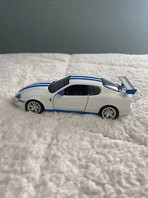 Diecast Model Car White / Blue Stripes MAISTO MASERATI TROFEO Firelli Scale 1/24 • $10